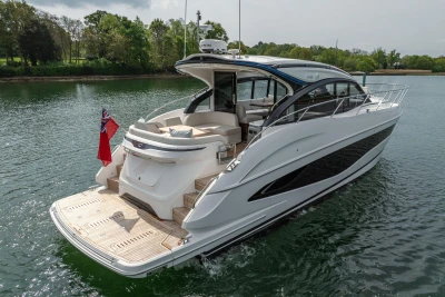 2025 Princess V50 yacht on water, sleek design, luxury features, rear view, open deck.