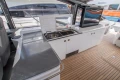 Luxurious 2016 Princess V58 Open yacht interior with sleek kitchen and modern amenities.