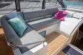 Luxurious seating area on 2016 Princess V58 Open yacht with colorful cushions.