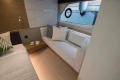 Luxurious interior of 2016 Princess V58 Open yacht with elegant seating and decor.