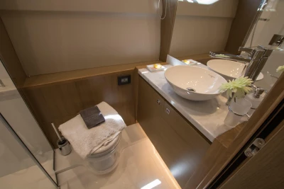 Luxurious bathroom in 2016 Princess V58 Open yacht with modern fixtures and elegant design.