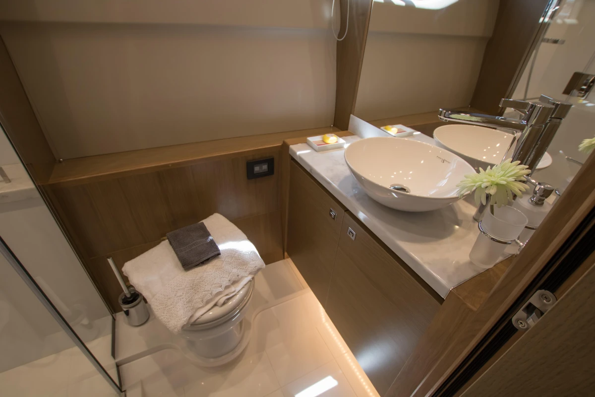 Luxurious bathroom in 2016 Princess V58 Open yacht with modern fixtures and elegant design.