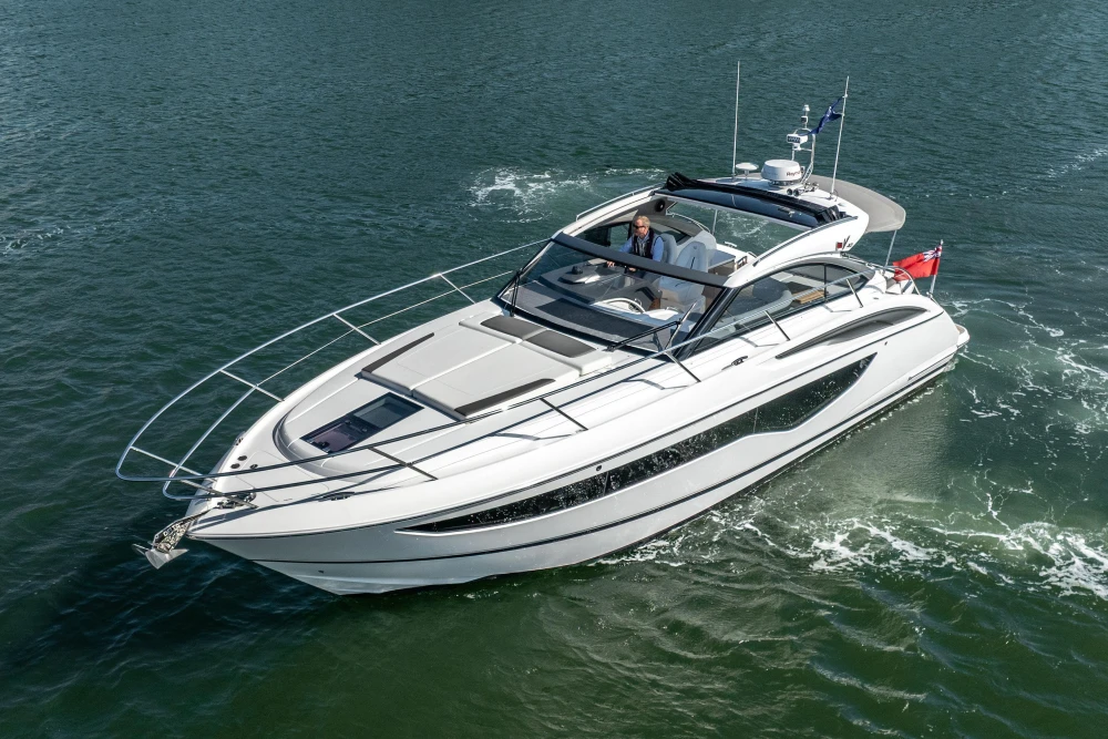2024 Princess V40 yacht cruising on open water, showcasing sleek design and luxury features.