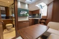 Luxurious interior of 2024 Princess V40 yacht with modern wood finishes and elegant design.