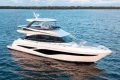 2025 Princess F65 yacht cruising on open water, showcasing sleek design and luxury features.