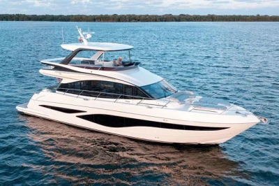 2025 Princess F65 yacht cruising on open water, showcasing sleek design and luxury features.