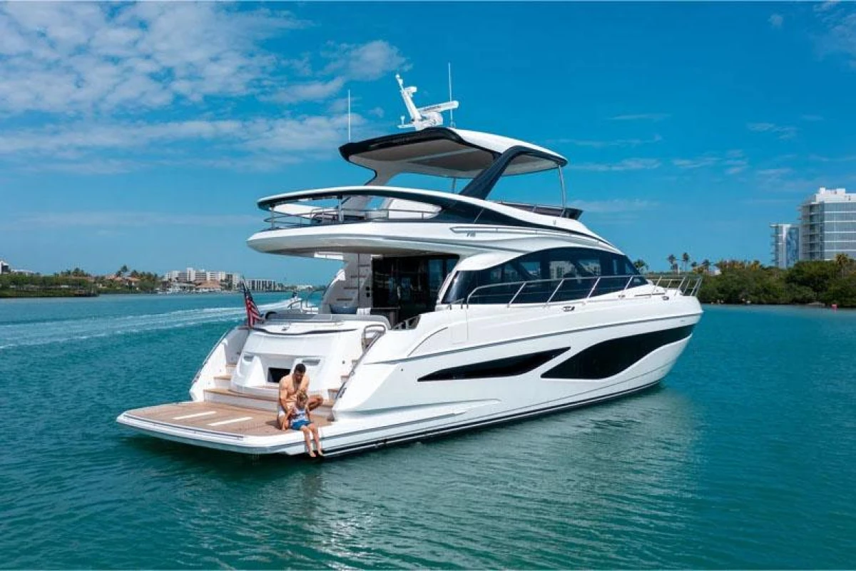Luxury Princess F65 yacht cruising on clear blue waters, 2025 model.