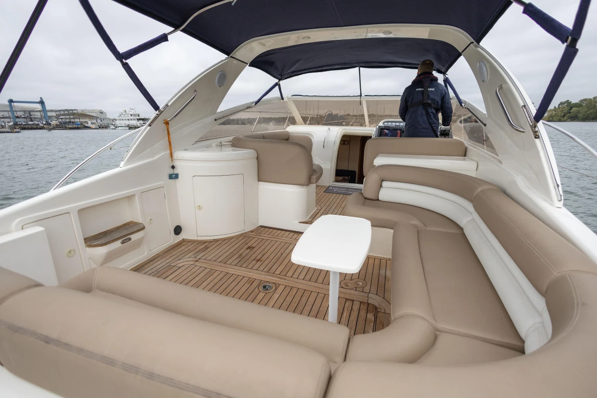 Luxurious 2000 Princess V42 yacht interior with spacious seating and elegant design.