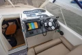Cockpit of 2000 Princess V42 yacht with navigation system and luxurious interior.
