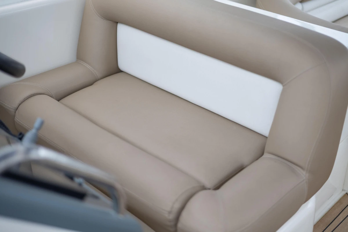 Beige and white leather seating on a 2000 Princess V42 yacht.