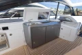 2024 Princess V50 Open yacht interior with sleek kitchenette and modern design.