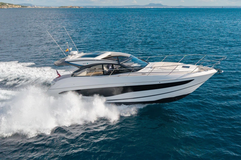 2024 Princess V50 Open yacht cruising on open sea, showcasing sleek design and performance.
