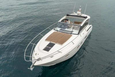 2014 Princess V39 yacht cruising on calm waters, featuring sleek design and spacious deck.