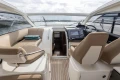 Interior of 2014 Princess V39 yacht with helm and seating area.