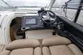 Helm of 2014 Princess V39 yacht with navigation system and steering wheel.