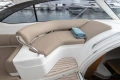 Luxurious seating area on a 2014 Princess V39 yacht with a folded towel.