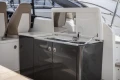 Luxury yacht Princess V39 2014 interior with sleek kitchenette and modern design.
