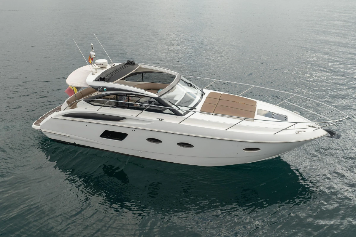 2014 Princess V39 yacht on calm water, showcasing sleek design and luxury features.