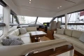 Luxurious interior of a 2017 Princess 49 yacht with elegant seating and modern design.