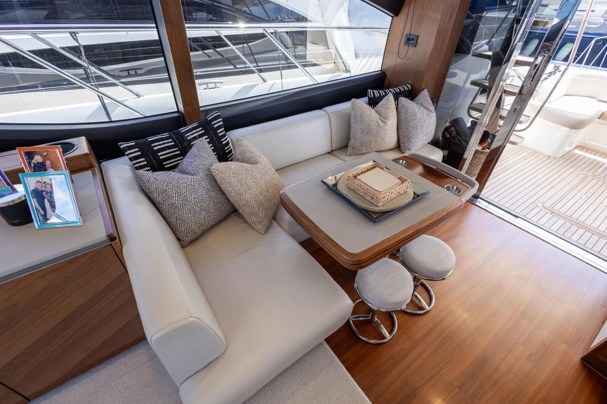 Luxurious interior of 2022 Princess S66 yacht with elegant seating and decor.