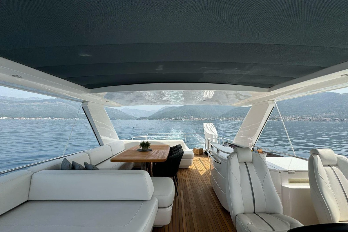 Luxurious 2022 Princess S66 yacht interior with elegant seating and scenic ocean view.