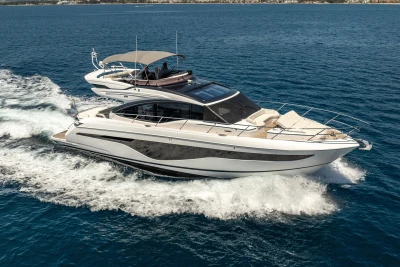 2023 Princess S62 yacht cruising on open water, showcasing sleek design and luxury features.