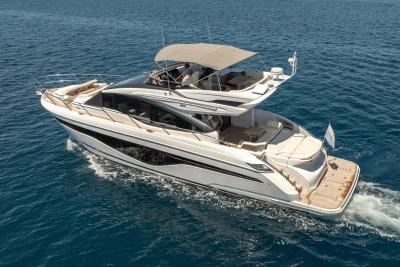 2023 Princess S62 yacht cruising on open water, showcasing sleek design and luxury features.