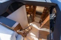 Luxurious interior of 2023 Princess S62 yacht, featuring elegant wood finishes and modern design.