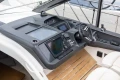 2017 Princess V48 Open yacht helm with modern navigation controls and sleek design.