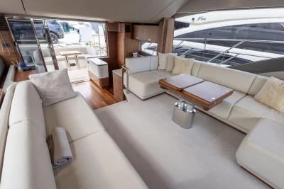 Luxurious interior of 2023 Princess F55 yacht with elegant seating and modern design.