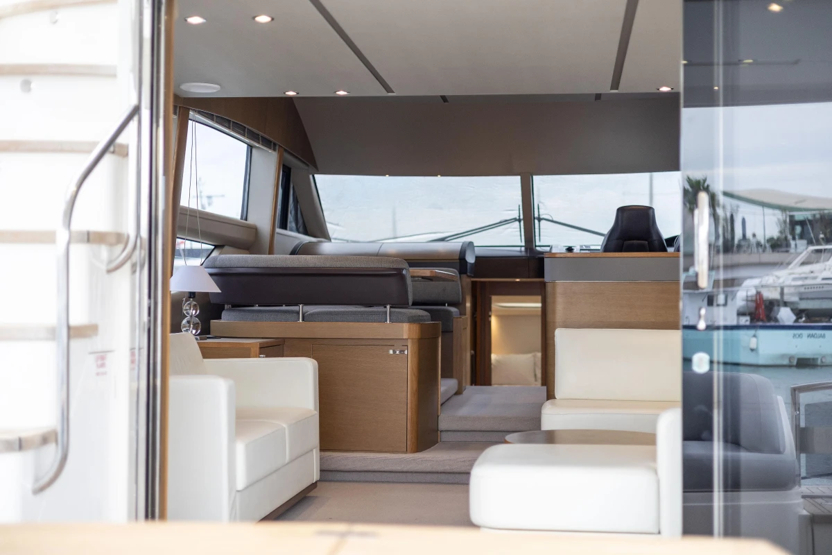 Luxurious interior of a 2014 Princess 56 yacht with modern furnishings and elegant design.
