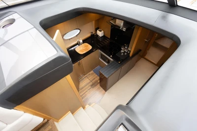 Luxurious 2014 Princess V52 yacht interior kitchen with modern amenities and sleek design.