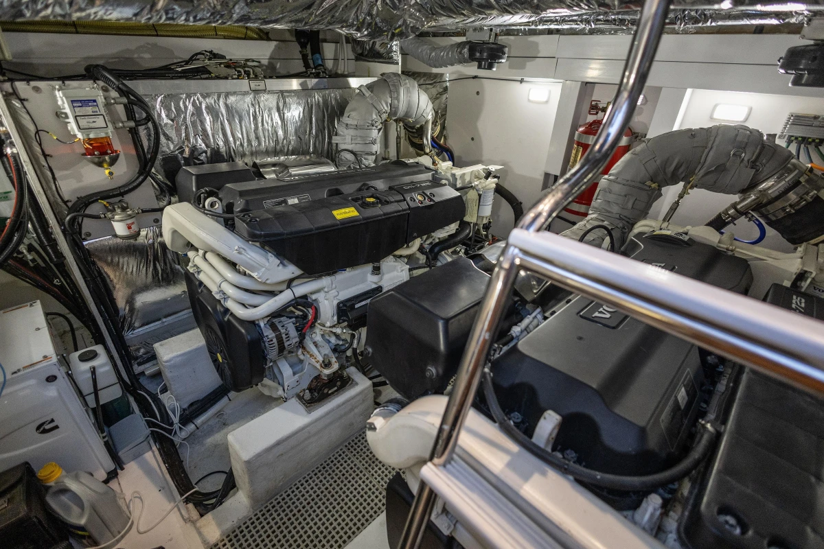 Engine room of a 2014 Princess V52 yacht, showcasing advanced machinery and equipment.