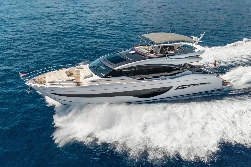 Luxurious 2022 Princess S78 yacht cruising on open sea.