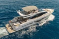 Luxurious 2022 Princess S78 yacht cruising on open blue sea.