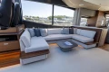 Luxurious interior of 2023 Princess S72 yacht with modern seating and elegant design.
