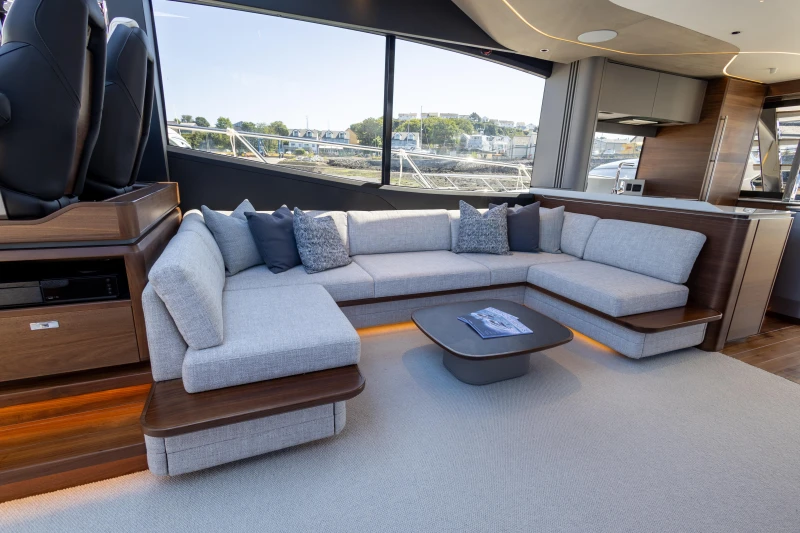 Luxurious interior of 2023 Princess S72 yacht with modern seating and elegant design.