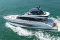 Luxurious 2023 Princess S72 yacht cruising on open water.
