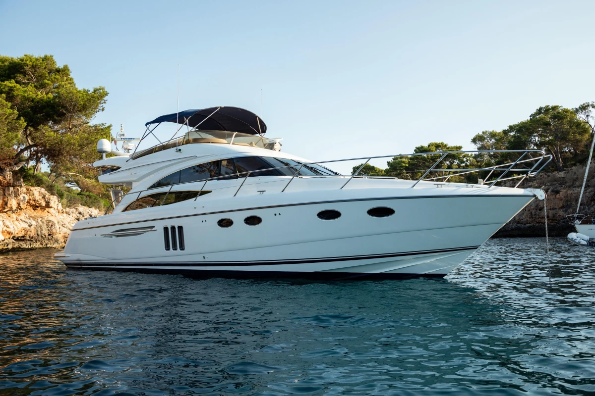 Luxury 2008 Princess 58 yacht cruising in scenic coastal waters.