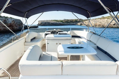 Luxurious 2008 Princess 58 yacht interior with elegant seating and scenic ocean view.