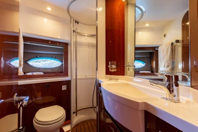 Luxurious bathroom in 2008 Princess 58 yacht with modern fixtures and elegant design.