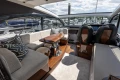 Luxurious interior of 2023 Princess V50 yacht with plush seating and elegant design.