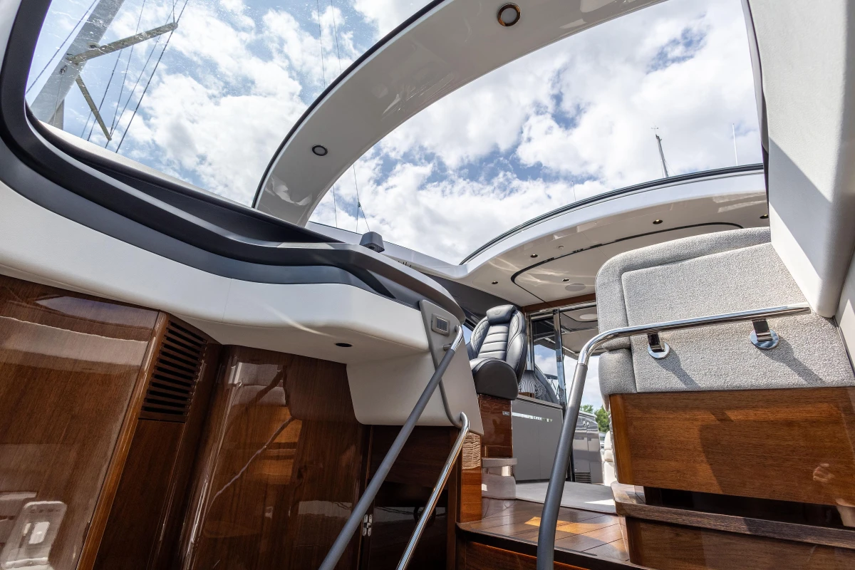 Interior view of 2023 Princess V50 yacht, showcasing luxurious seating and sleek design.