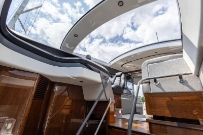 Interior view of 2023 Princess V50 yacht, showcasing luxurious seating and sleek design.