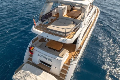Luxury 2017 Princess 68 yacht on open water, featuring spacious deck and seating areas.