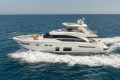 Luxury 2017 Princess 68 yacht cruising on open sea.
