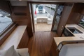 Interior of 2025 Princess F50 yacht with modern kitchen and deck.