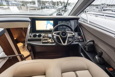 Princess F50 yacht helm, 2025 model, featuring advanced navigation system.