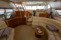 Luxurious interior of a 1995 Princess 60 yacht with leather seating and modern amenities.