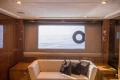 Luxurious interior of 2013 Princess 72 Motor Yacht with ocean view window.